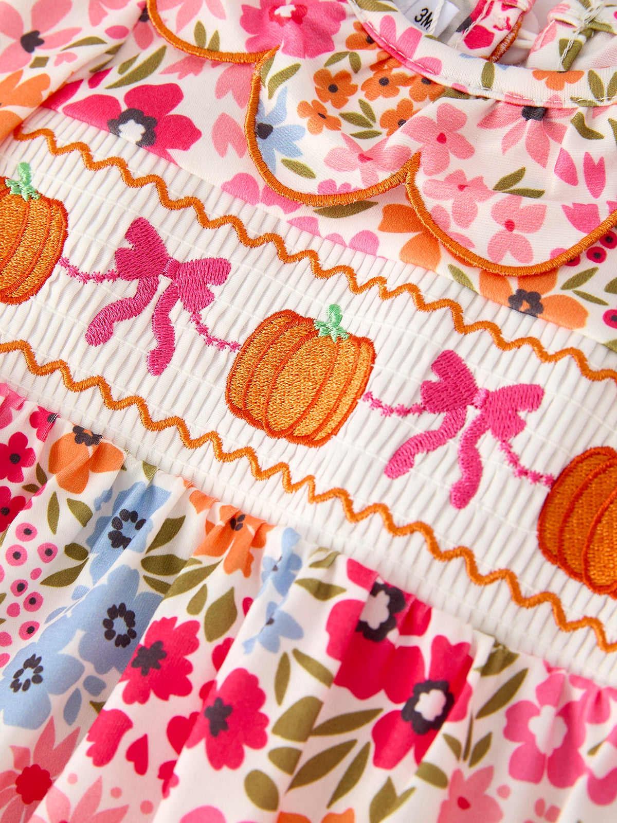 Pumpkin Floral Smocked Romper
